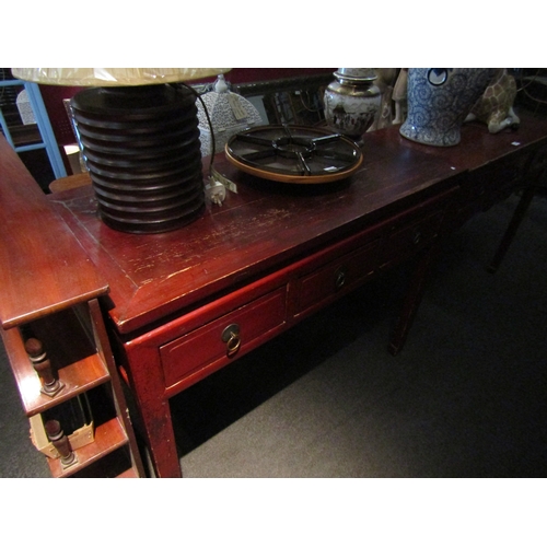 1022 - Two Country and Eastern cinnabar coloured Oriental tables with three drawers, largest 90cm tall x 11... 