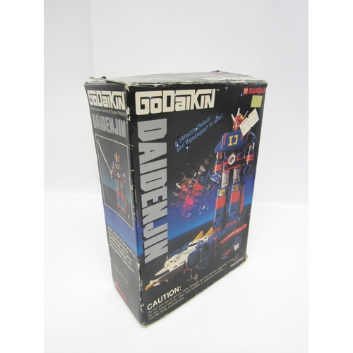 5011 - A boxed Bandai Godaikin Daidenjin robot action figure #377033 with accessories (unchecked for comple... 