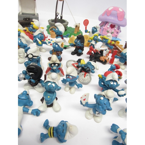 5031 - A collection of vintage Peyo/Schleich Smurfs and accessories