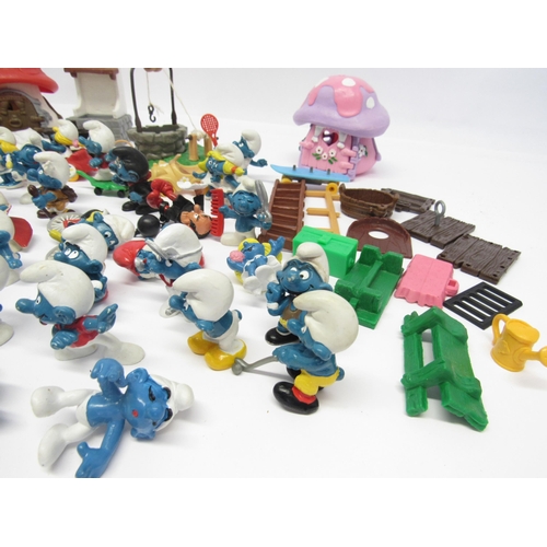 5031 - A collection of vintage Peyo/Schleich Smurfs and accessories