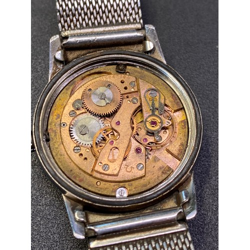 8175 - OMEGA: An Omega Seamaster automatic wristwatch circa 1961 with black dial, gold baton markers and ca... 