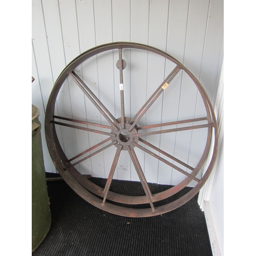 7006 - A pair of all iron implement wheels, 113cm diameter