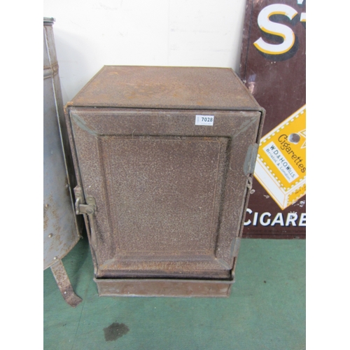 7028 - A metal storage cabinet with brass latch