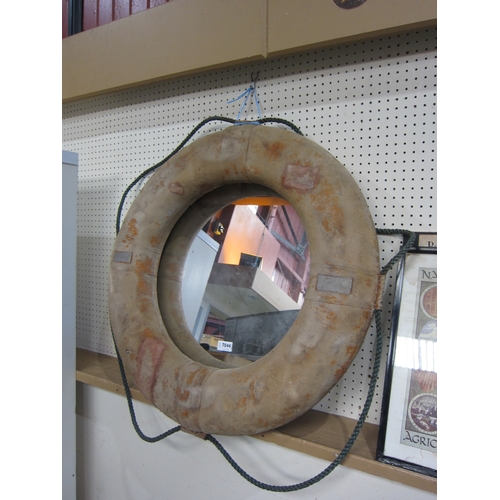 7044 - A life ring with mirror added to centre