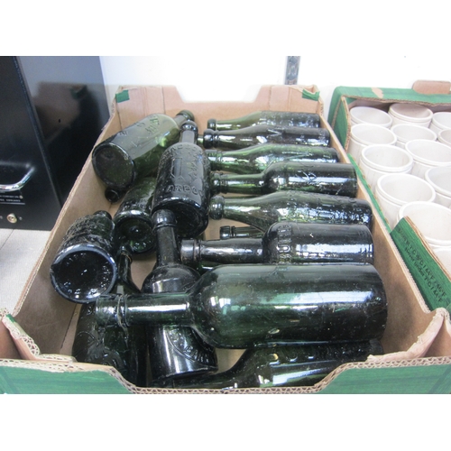 7067 - A box of green glass bottles including Edmondson & Co