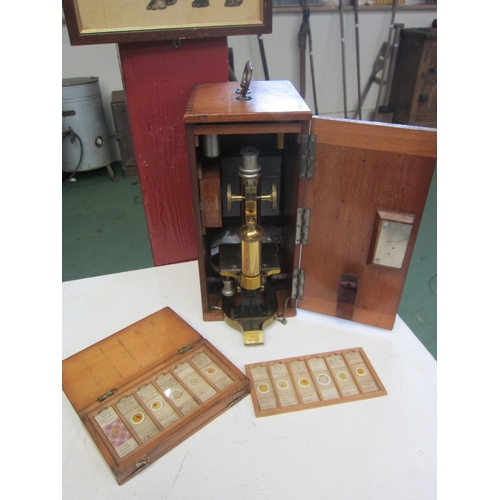 7072 - A 19th Century C.Reichert Wien No.17705 monocular microscope in fitted mahogany case with a mahogany... 