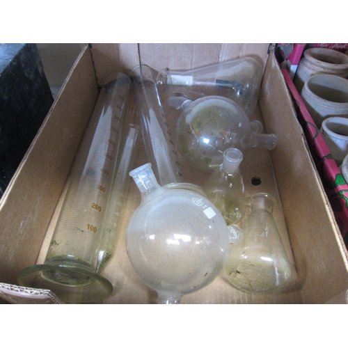 7082 - A box of scientific glass measuring vessels