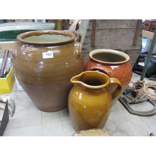 7087 - Two glazed crocks and glazed jug