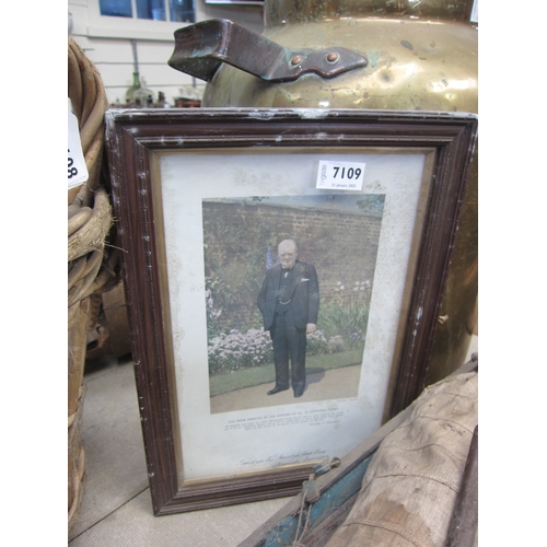 7109 - A framed and glazed photograph of Winston Churchill