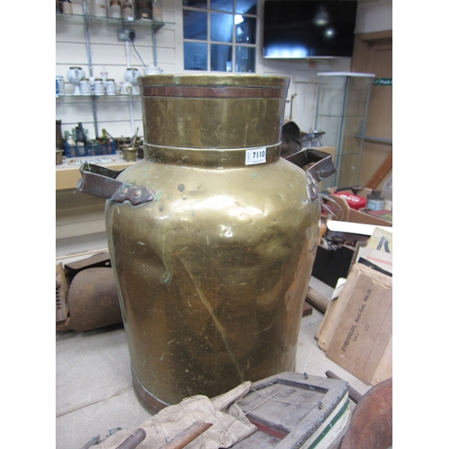 7110 - A large brass churn, no lid, 57cm tall