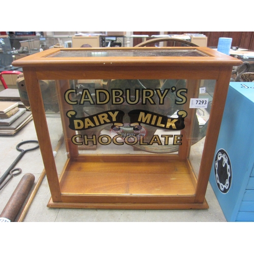 7293 - A table top display cabinet with later painted Cadbury's lettering