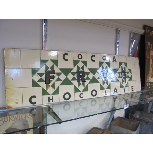 7307 - A green and white enamel splash back with later painted Fry's lettering, 107cm x 31cm