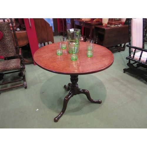 4095 - An early George III circa 1760 Cuban mahogany circular tilt-top wine table over a turned & wrythen c... 