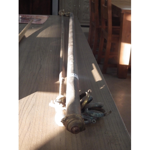 3321 - A Victorian brass curtain rail 170cm long a/f