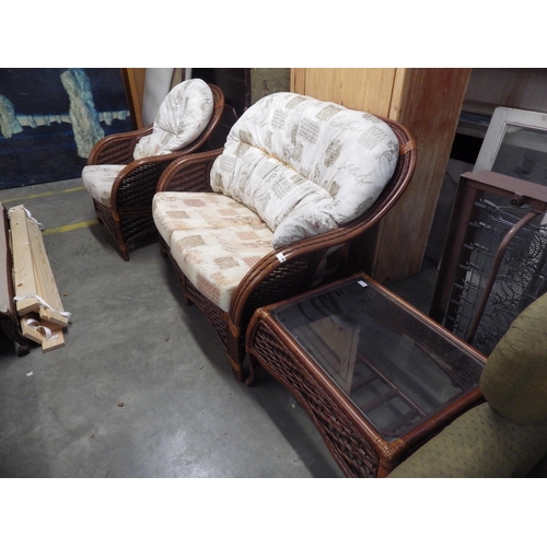 3328 - A modern stained bamboo conservatory set, comprising a two-seater settee, a chair and an occasional ... 