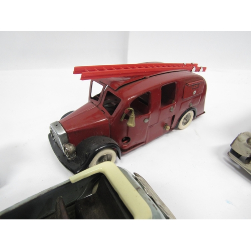 5060 - A collection of loose and playworn Triang Minic clockwork vehicles, comprising nine tinplate example... 