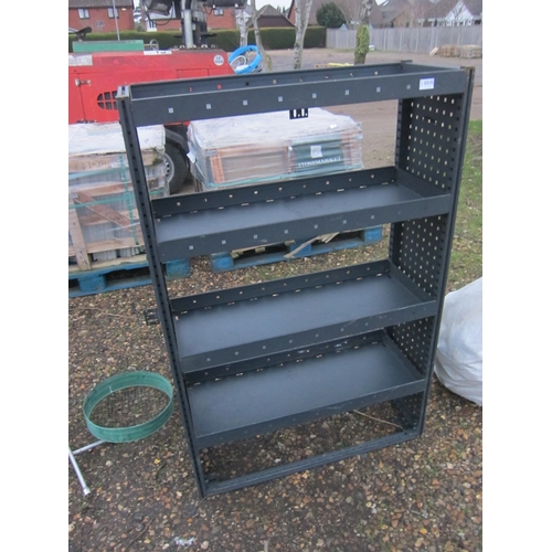 3315 - A metal four tier shelving unit