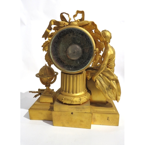 8048 - An early 19th Century French gilt metal mantel clock depicting Urania, white enamel Roman numeral di... 