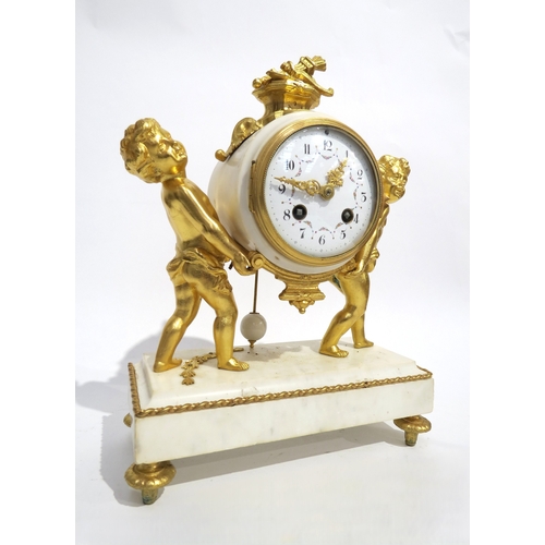 8057 - A 19th Century Louis XVI style white marble and ormolu/gilt metal mantel clock, the marble surrounde... 