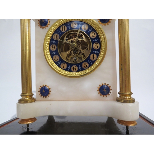 8034 - A continental white marble and gilt metal mantel clock surmounted by a cast metal lion all under a l... 