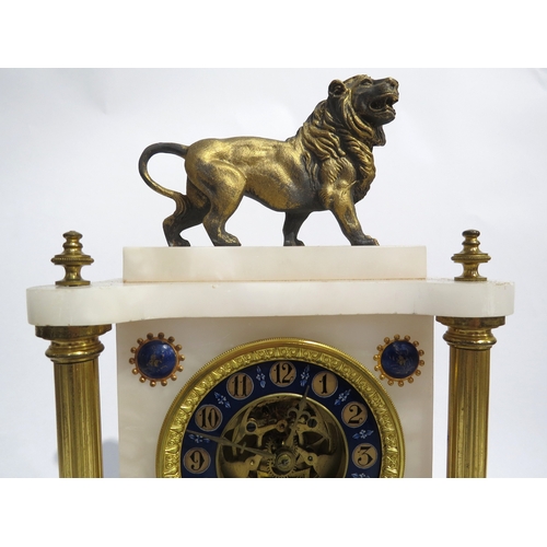 8034 - A continental white marble and gilt metal mantel clock surmounted by a cast metal lion all under a l... 