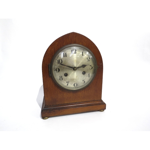 8072 - A German arched top chiming mantel clock with parquetry outline to front, silvered Arabic dial (scra... 