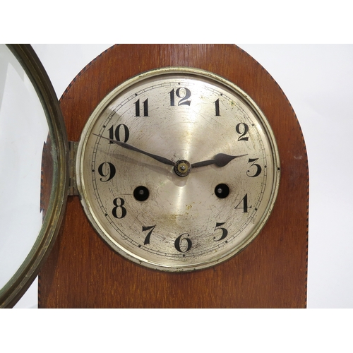 8072 - A German arched top chiming mantel clock with parquetry outline to front, silvered Arabic dial (scra... 