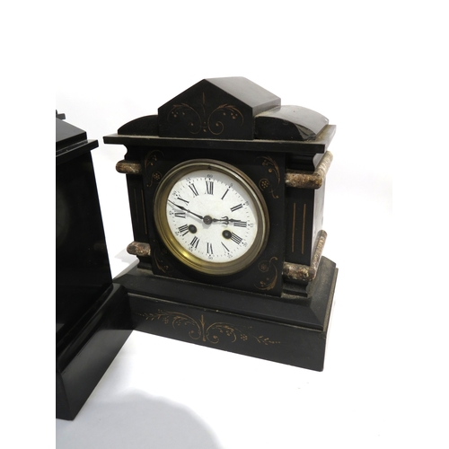 8067 - Three black slate and marble mantel clocks, each of architectural form, one with a cream enamel Arab... 