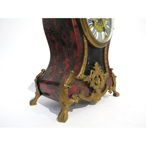 8069 - A French boulle clock with ornate gilt metal inlaid tortoiseshell case, enamel cartouche Roman numer... 