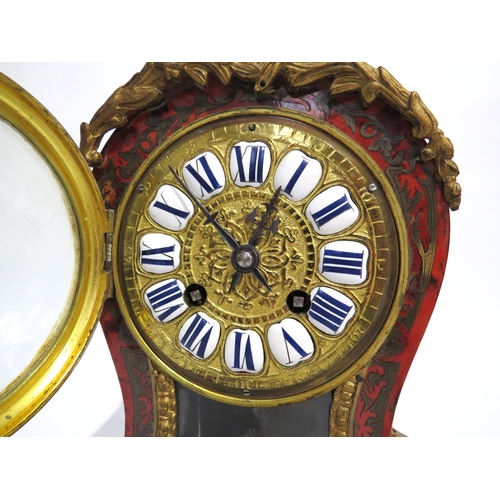 8069 - A French boulle clock with ornate gilt metal inlaid tortoiseshell case, enamel cartouche Roman numer... 