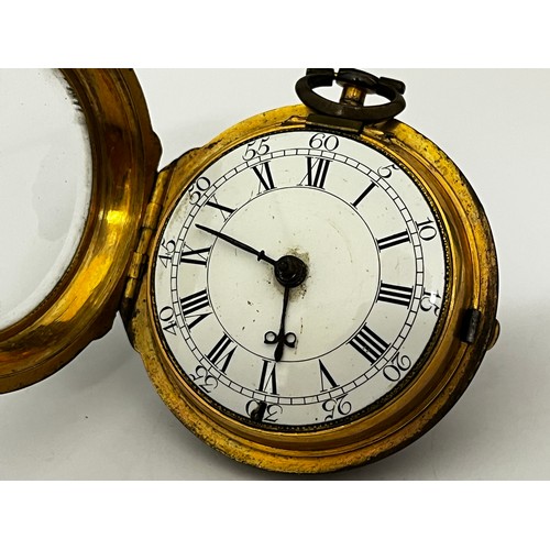 5209 - JOHN GORDON OF LONDON: An 18th Century gilt metal cased pocket watch. The enamelled Roman and Arabic... 