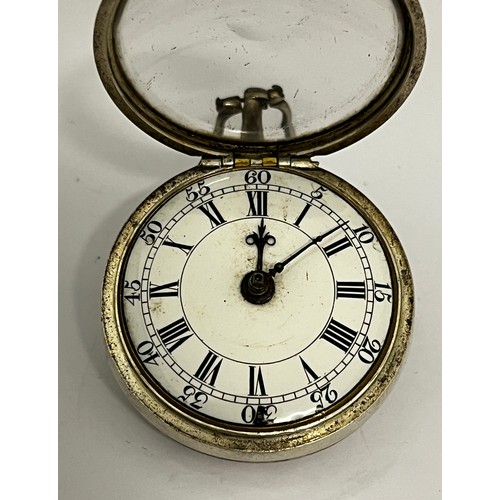 5208 - J. WOOD OF LONDON: An 18th Century silver pair cased pocket watch. The enamelled dial with pierced b... 