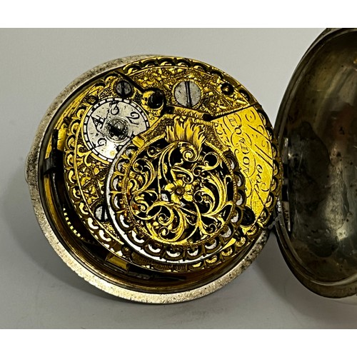 5208 - J. WOOD OF LONDON: An 18th Century silver pair cased pocket watch. The enamelled dial with pierced b... 