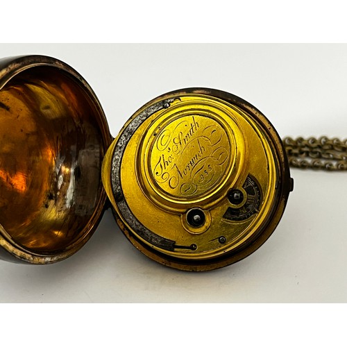 5201 - THOMAS SMITH OF NORWICH: An early to mid 18th Century gilt metal pair cased pocket watch. The enamel... 