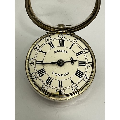 5204 - SIGNED MASSEY, LONDON: An early to mid 18th Century silver pair cased pocket watch. The enamelled Ro... 