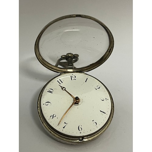 5195 - WILLIAM HUGGIN OF ASHWELLTHORPE: A 19th Century silver pair cased pocket watch, the enamelled Arabic... 