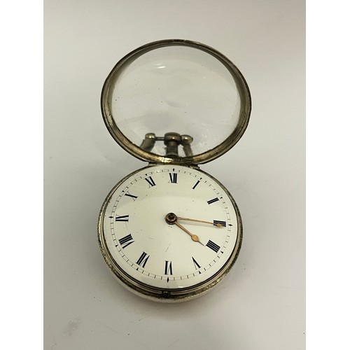 5192 - SIGNED JOHN GISCARD, NORWICH: A late 18th/early 19th Century silver pair cased pocket watch. The ena... 