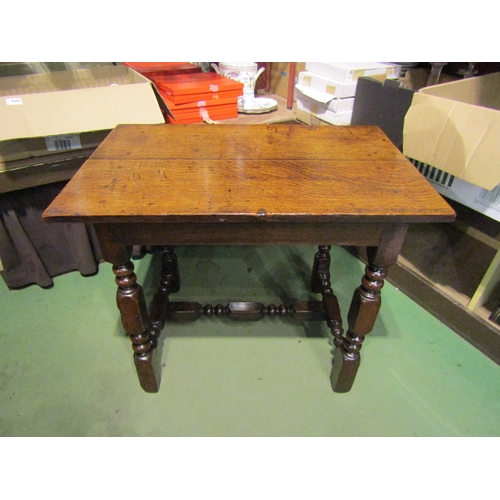 4001 - A 17th Century and later oak side table the two plank top over bobbin turned and square legs united ... 