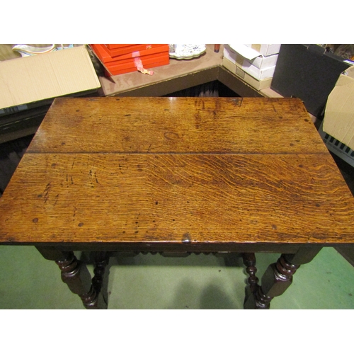 4001 - A 17th Century and later oak side table the two plank top over bobbin turned and square legs united ... 