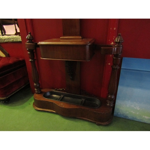 4018 - A William IV mahogany hat and stick stand with turned hangers, melon fluted supports and drip tray, ... 