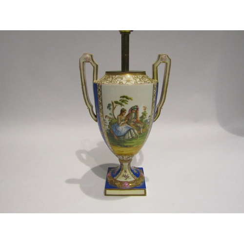 4054 - A porcelain Dresden style table lamp in the form of a Venetian urn with courting couple decoration