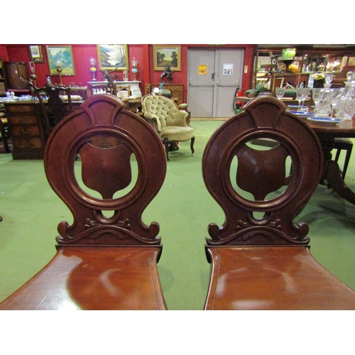 4059 - A pair of Victorian mahogany shield back chairs on turned front supports