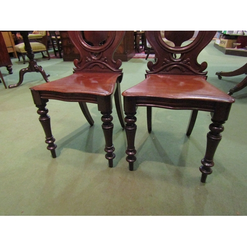 4059 - A pair of Victorian mahogany shield back chairs on turned front supports