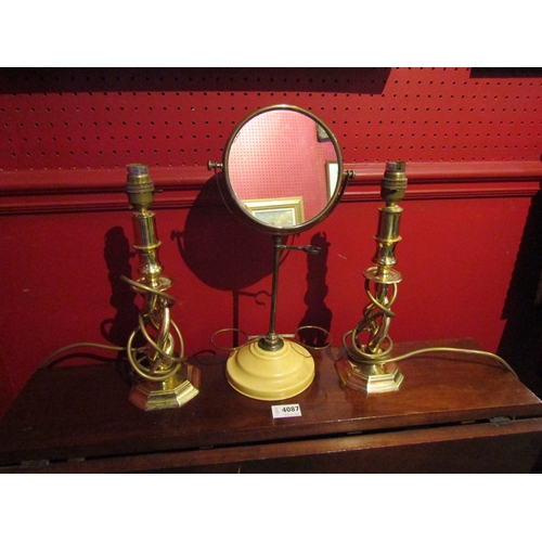 4086 - A pair of brass barley twist candlesticks and a bygone freestanding bathroom mirror (3)