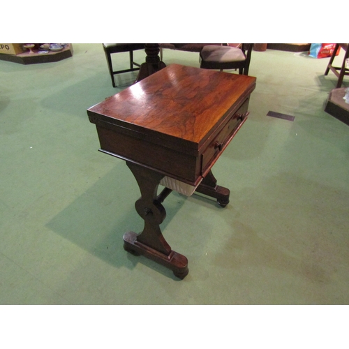 4091 - A Victorian rosewood sewing table with baize top, revolving action, single drawer, stretcher base