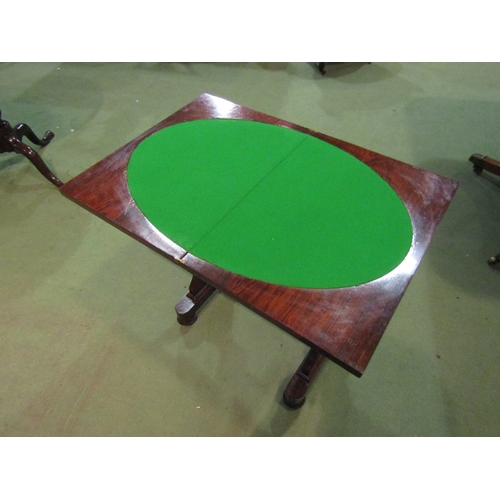 4091 - A Victorian rosewood sewing table with baize top, revolving action, single drawer, stretcher base