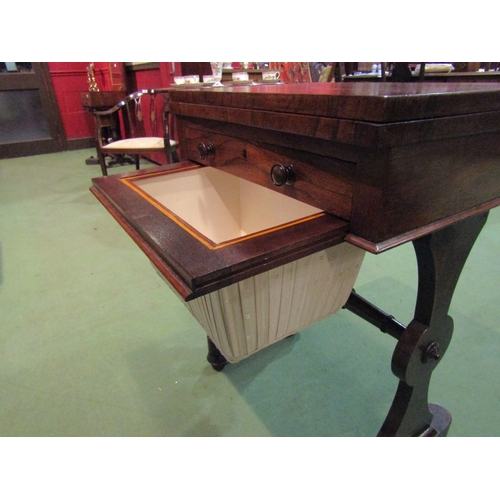 4091 - A Victorian rosewood sewing table with baize top, revolving action, single drawer, stretcher base