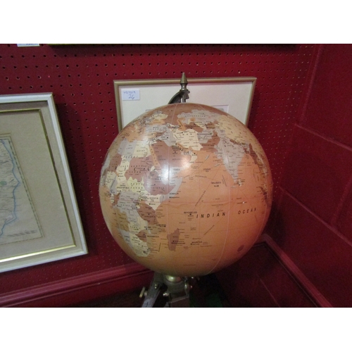 4109 - A night and day globe on brass and mahogany tripod base, globe 30cm diameter