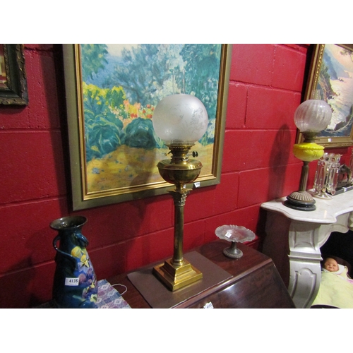 4136 - A brass based Corinthian column form oil lamp