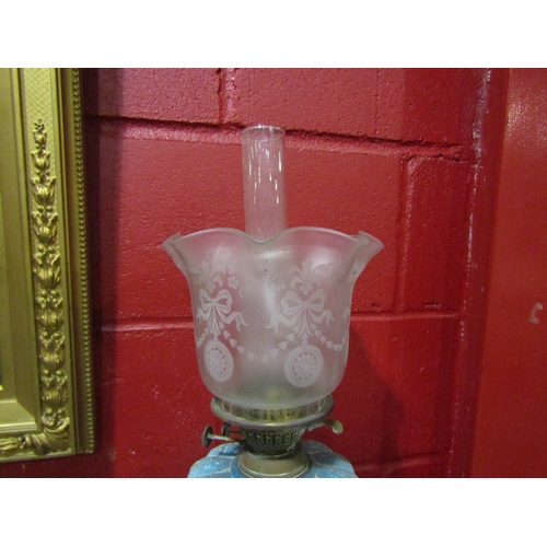 4142 - A Victorian oil lamp, blue glass reservoir, frosted etched shade